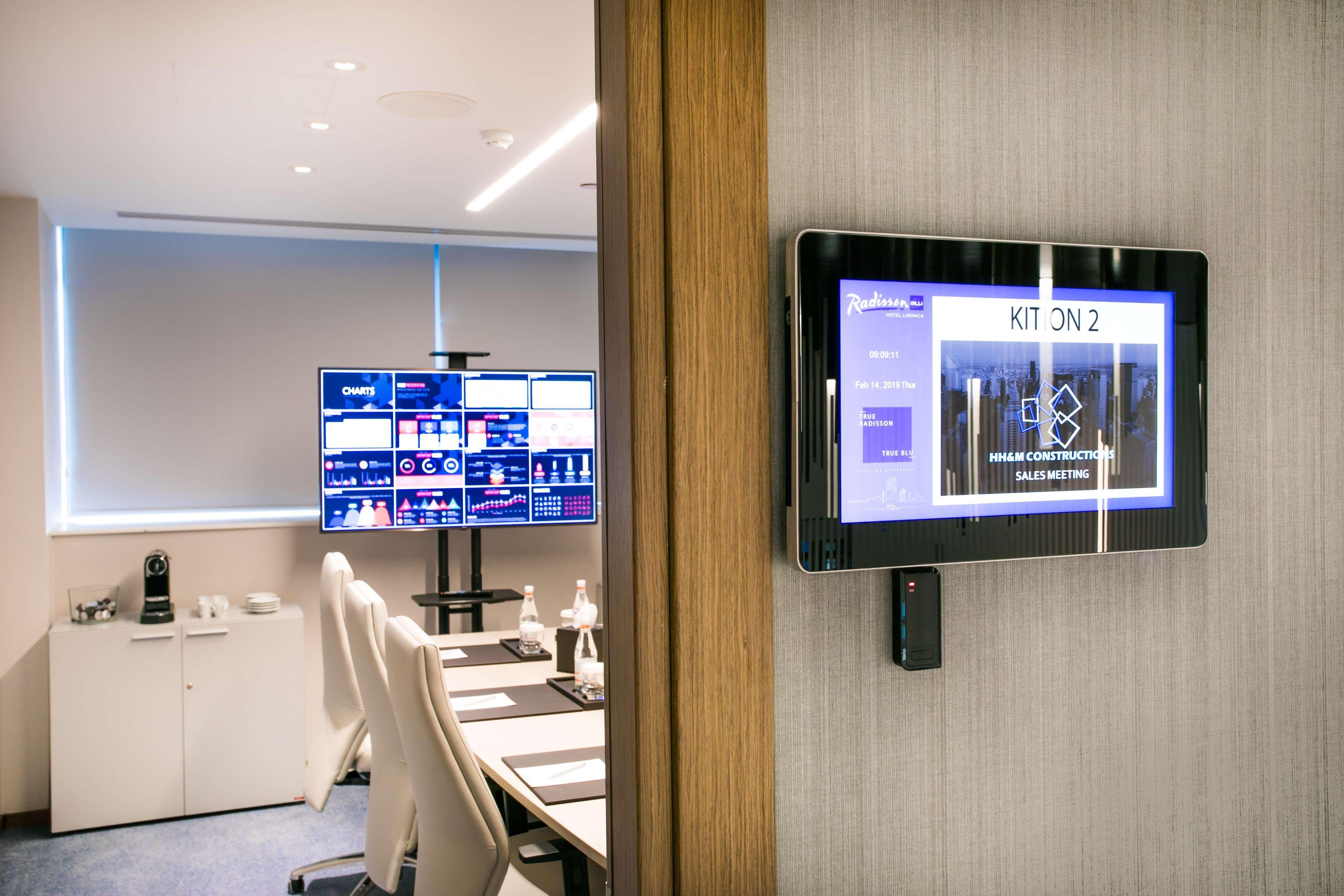 Radisson Blu Hotel, Larnaca Dış mekan fotoğraf A wall mounted video conferencing system